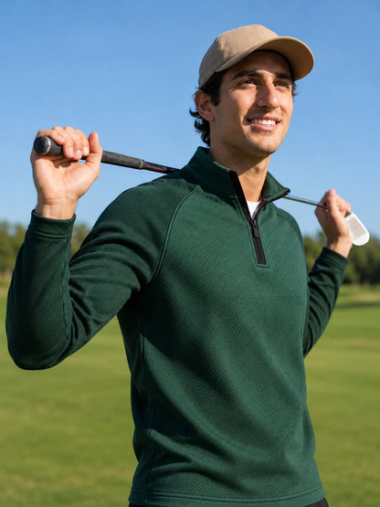 Golf-Pullover aus Funktionsmaterial in Waldgrün mit diagonaler Rippstruktur und Viertelreißverschluss