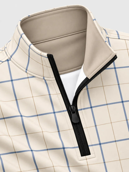 Golfpullover in Elfenbein mit blauem Fensterkaromuster und Viertelreißverschluss
