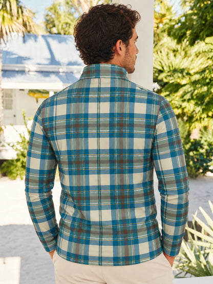 Golfpullover in Petrol und Creme mit Tartanmuster und Viertelreißverschluss
