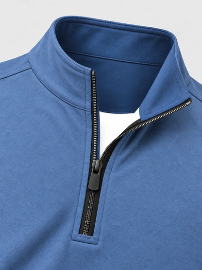 Staubblauer Golfpullover aus Funktionsmaterial mit strukturierter Oberfläche und kurzem Reißverschluss