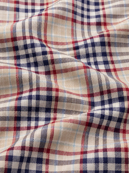 Cremefarbener Golf-Pullover mit Tartan-Karomuster und Viertelreißverschluss