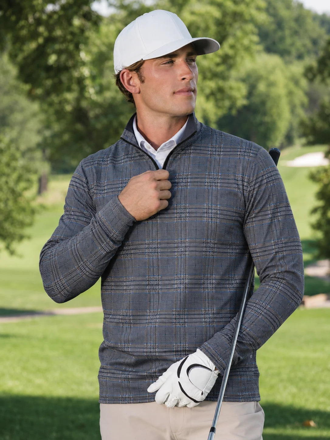 Blau-grauer Golfpullover aus Funktionsmaterial mit Karomuster und kurzem Reißverschluss