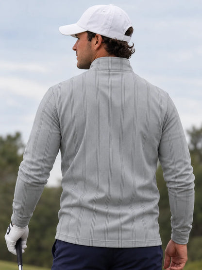 Silbergrauer Golfpullover mit feinem Nadelstreifenmuster, Funktionsmaterial und Viertelreißverschluss