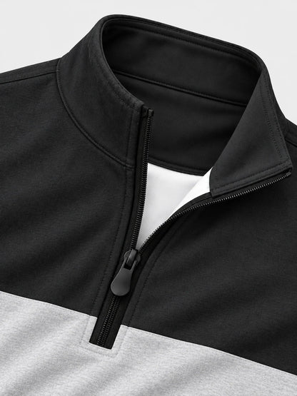 Schwarzer und grauer Golf-Pullover mit Colorblock-Design und kurzem Reißverschluss