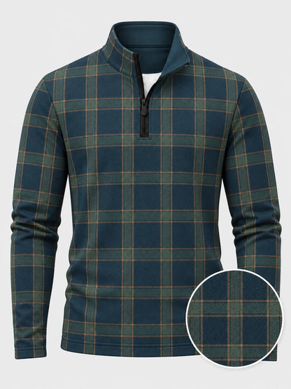 Golf-Pullover aus Funktionsmaterial in tiefem Blaugrün mit klassischem Heritage-Karomuster und Viertelreißverschluss