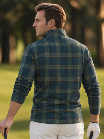 Golf-Pullover aus Funktionsmaterial in tiefem Blaugrün mit klassischem Heritage-Karomuster und Viertelreißverschluss