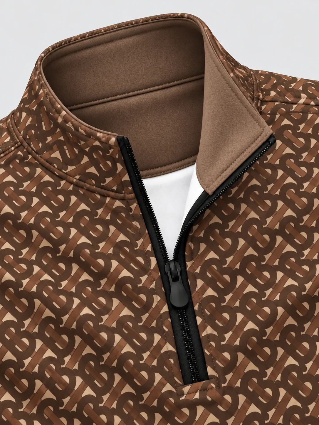 Performance-Pullover mit Viertelreißverschluss und Monogramm-Muster in Braun